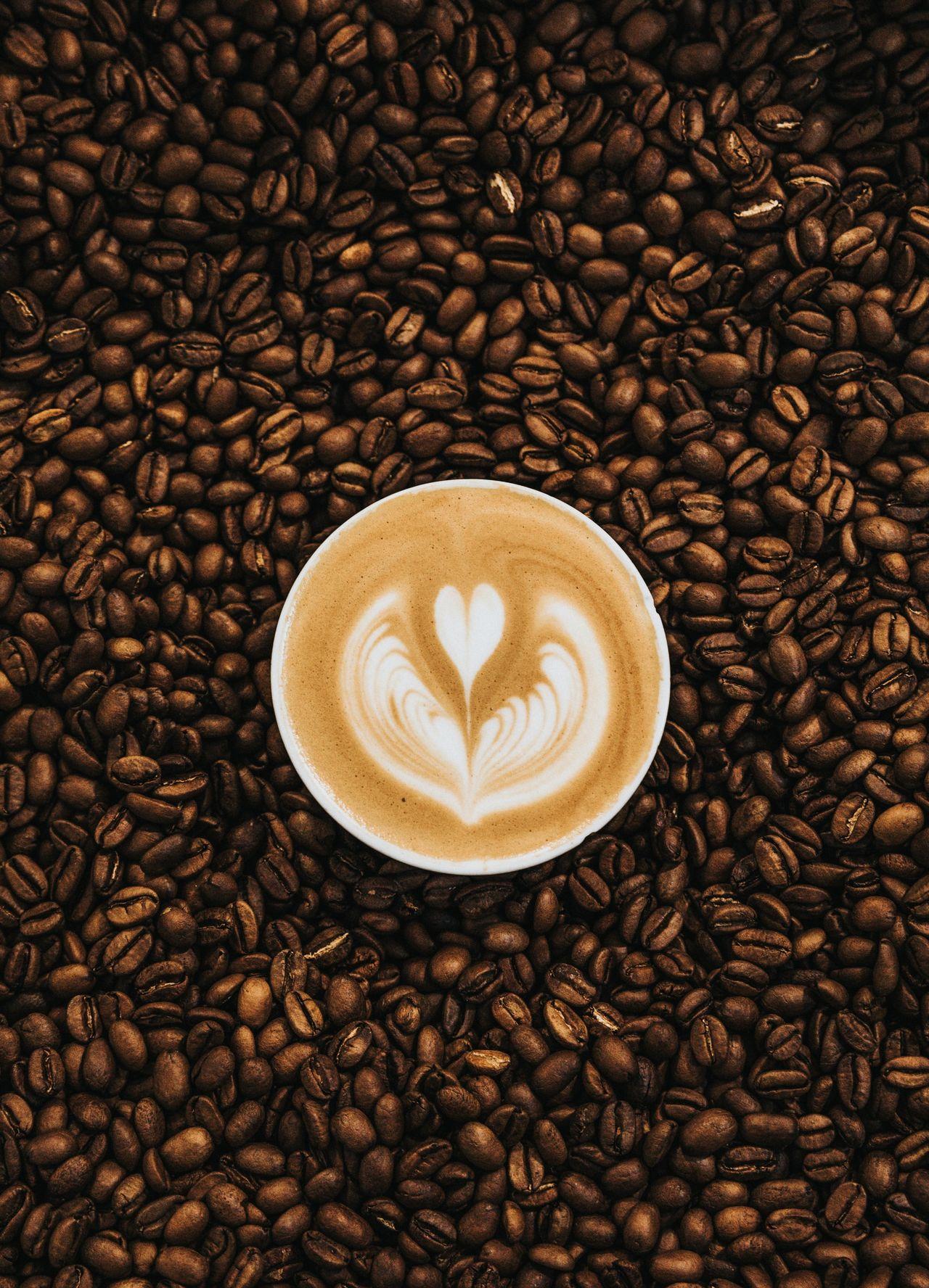 top view photography of heart latte coffee